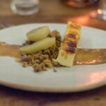 Marble Poached quince with brûléed custard, nut crumble and caramel sauce at Marble, Johannesburg
