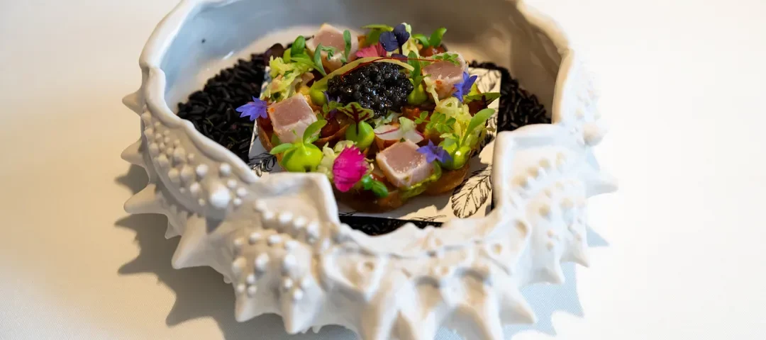 Top 15 incredible dishes of 2023 2023 - A white bowl with a fish in it.