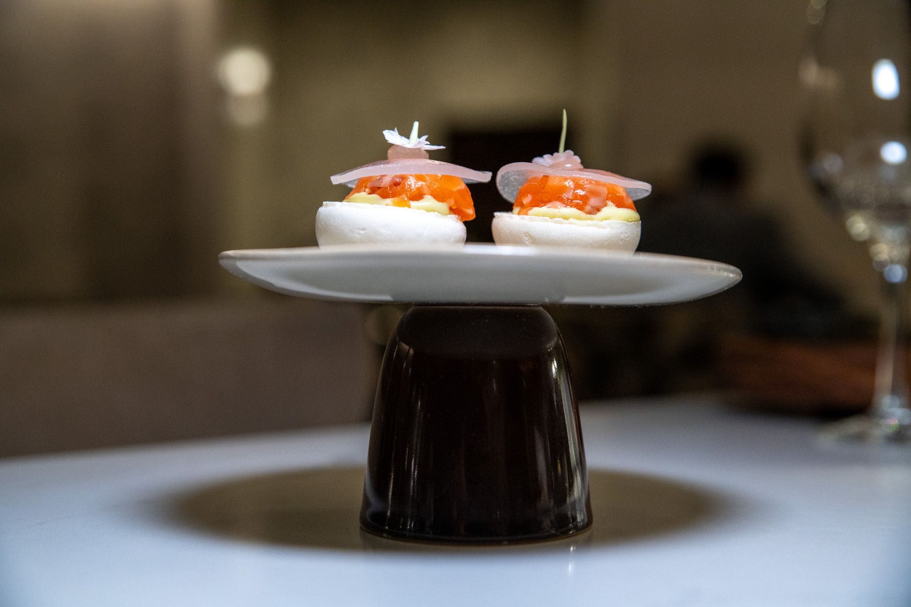 Signature dish presentation at Qunu X Le Petit Leon