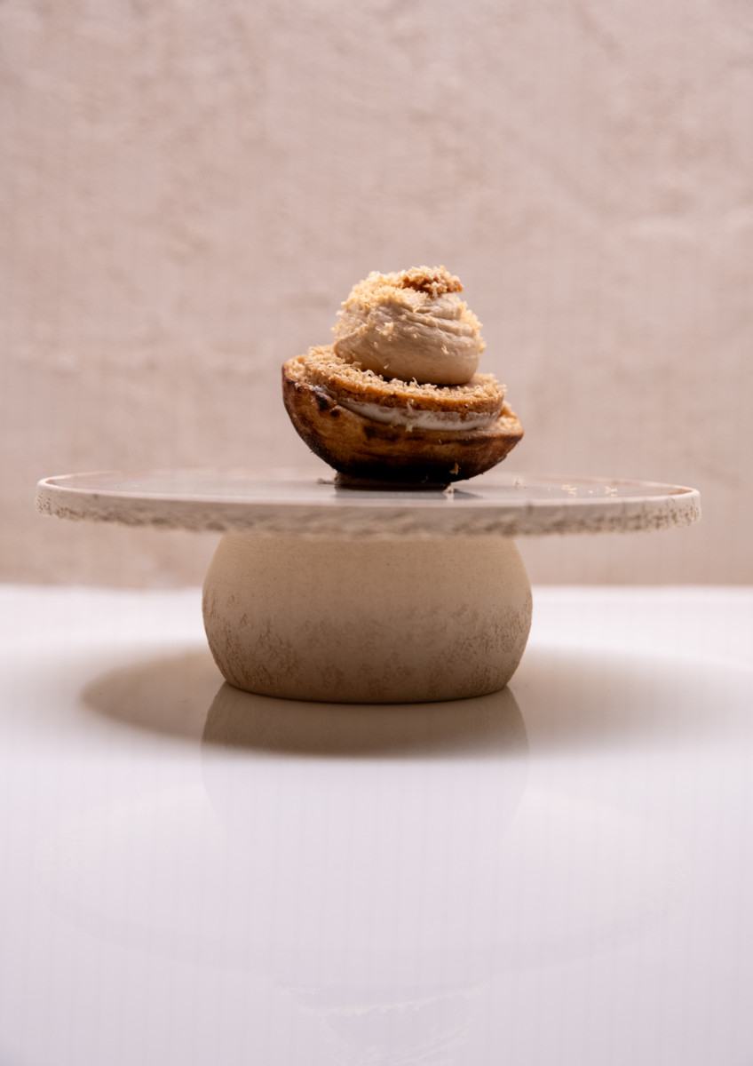 Signature dish presentation at Manao Dubai