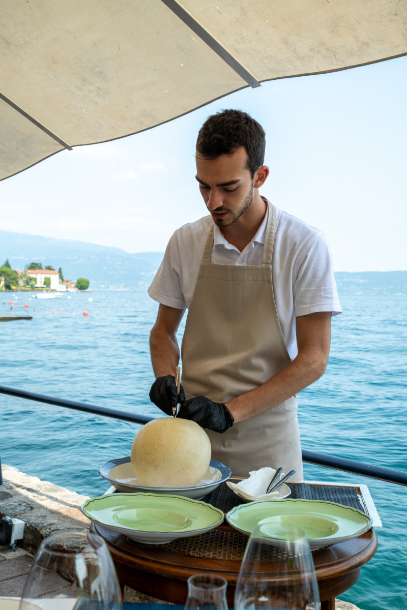 Chefs artful plating at Lido 84 Gardone Riviera
