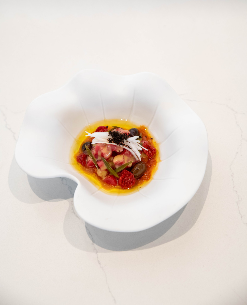 Umami Eclair with porcini emulsion and beef prosciutto at Orfali Bros