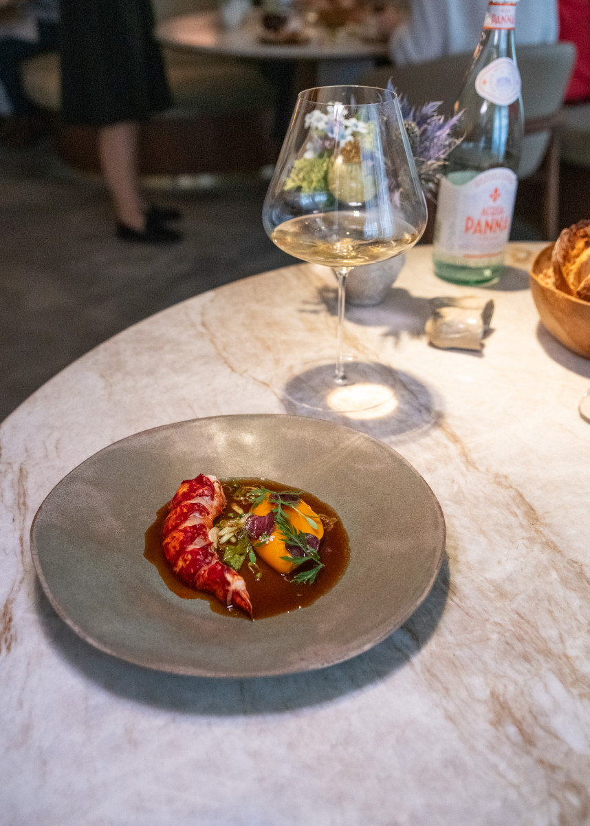 Soft natural tones and refined gold in Marsan's dining room, Paris 6th