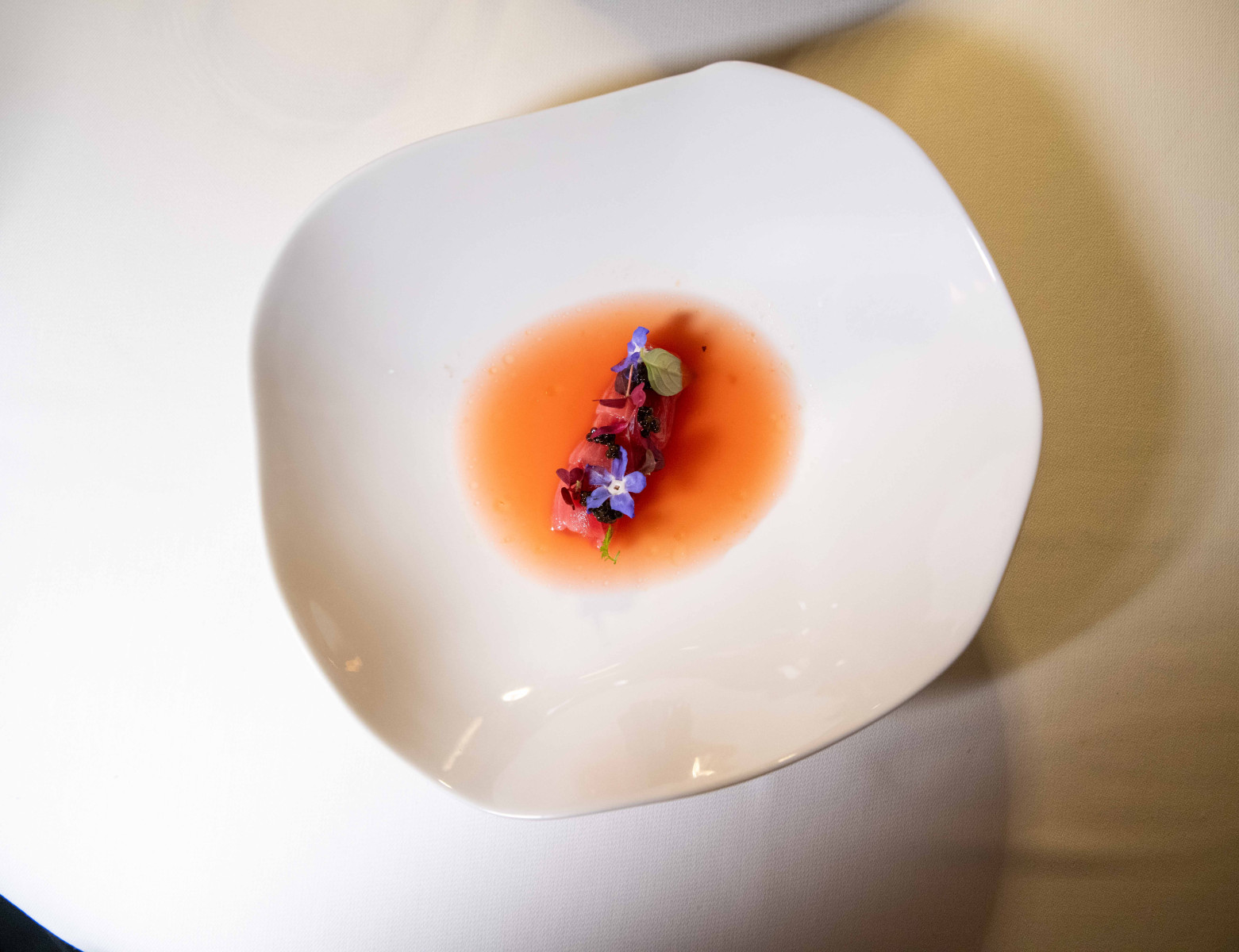 Peach and lavender dessert with crisp chocolate nibs at Autem Milan