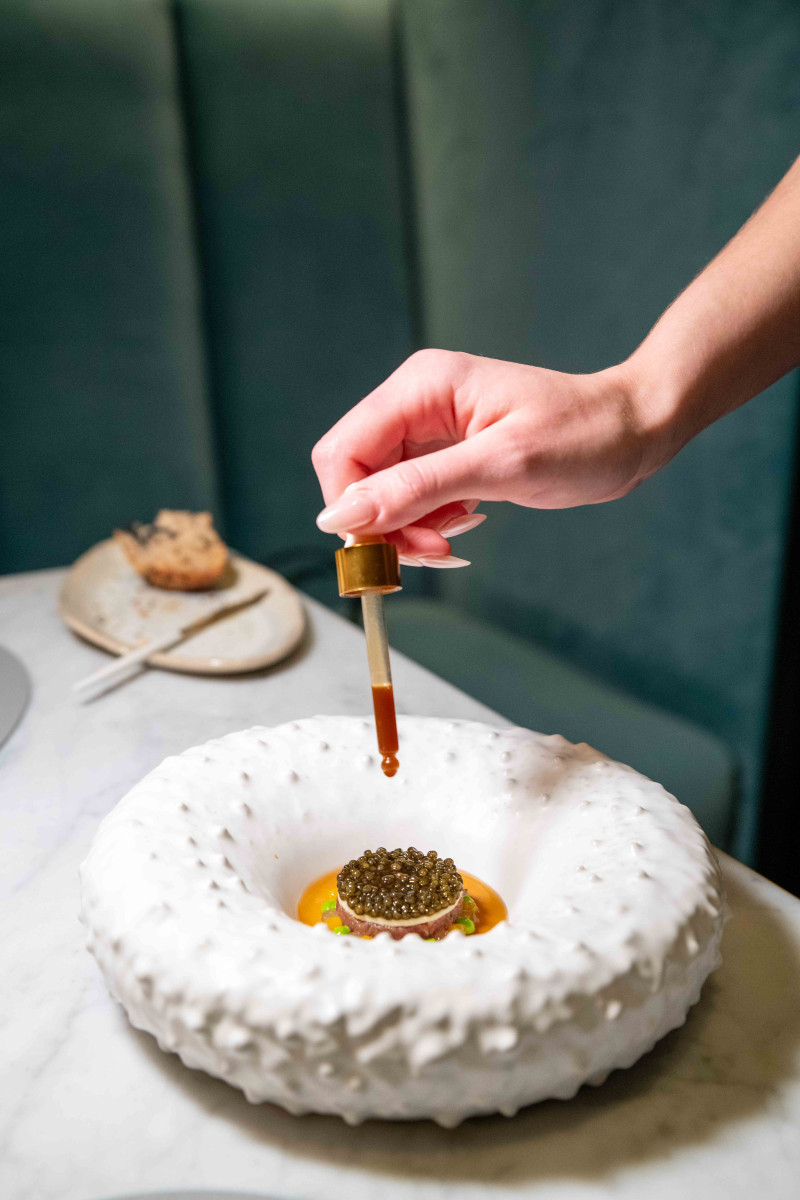 Refined plating of elevated Polish cuisine at Epoka Warsaw